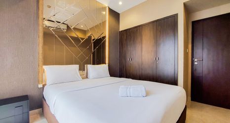 Bedroom 2 Comfortable and Scenic 2BR Branz BSD City Apartment By Travelio