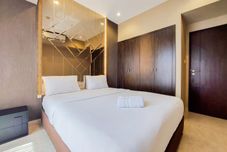 Bedroom Comfortable and Scenic 2BR Branz BSD City Apartment By Travelio