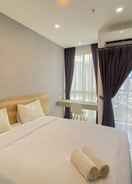 BEDROOM Homey and Elegant Studio Ciputra World 2 Apartment By Travelio