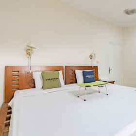 Bedroom 2 Urbanview Hotel Mon Bel Cibodas by RedDoorz, Puncak Hotels