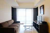 Lobby Homey and Good 2BR at Braga City Walk Apartment By Travelio