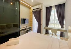 Bedroom 2 Comfortable and Restful Studio at Ciputra World 2 Apartment By Travelio