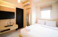 Bedroom 2 Comfy and Compact Studio at Puri Mas Apartment By Travelio