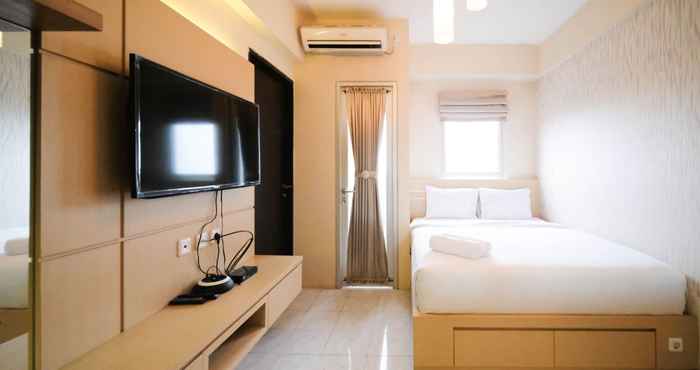 Bedroom Comfy and Compact Studio at Puri Mas Apartment By Travelio