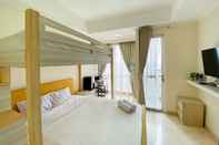 Bedroom Modern and Comfort Studio Apartment at Menteng Park By Travelio