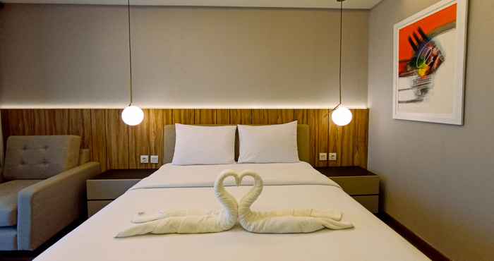 Kamar Tidur Cozy and Clean Studio at Mataram City Apartment By Travelio