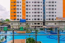Swimming Pool Comfy and Nice Studio at Green Pramuka City Apartment By Travelio