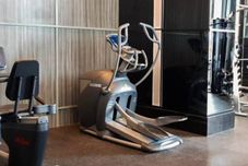 Fitness Center Comfort Designed and Tidy 1BR at Brooklyn Alam Sutera Apartment By Travelio