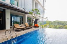 Lobby Comfort Designed and Tidy 1BR at Brooklyn Alam Sutera Apartment By Travelio