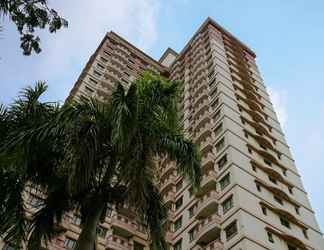 Bangunan 2 Cozy and Best Deal 2BR Puri Garden Apartment By Travelio