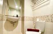 In-room Bathroom 6 Simply Look and Warm Studio Tamansari Iswara Apartment By Travelio