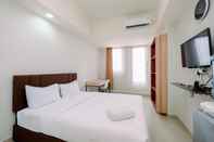 Bedroom Cozy and Simply Look Studio Evenciio Margonda Apartment By Travelio
