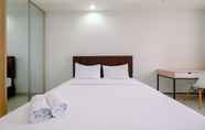 Kamar Tidur 2 Cozy and Simply Look Studio Evenciio Margonda Apartment By Travelio