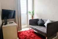 Lobby Homey and Tidy 2BR Apartment at The Edge Bandung By Travelio