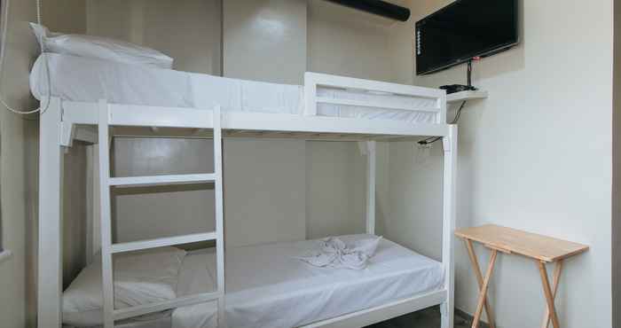Bedroom Filmore Suites Makati by RedDoorz
