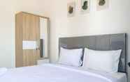 Bedroom 2 Comfortable and Homey Studio Tokyo Riverside PIK 2 Apartment By Travelio