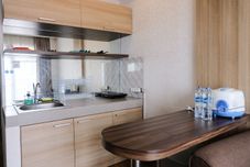 共用スペース Cozy and Homey 2BR at Mekarwangi Square Cibaduyut Apartment By Travelio