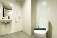 In-room Bathroom Minimalist Studio Gateway Park LRT City Bekasi Apartment By Travelio