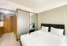 Bedroom 3 Cozy and Homey Stay Studio Gateway Park LRT City Bekasi Apartment By Travelio