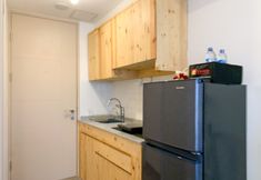 Common Space 3 Minimalist and Enjoy Studio at Tokyo Riverside PIK 2 Apartment By Travelio