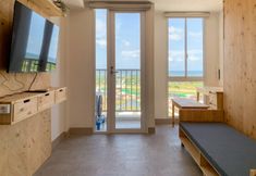 Common Space 2 Minimalist and Enjoy Studio at Tokyo Riverside PIK 2 Apartment By Travelio