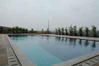 Kolam Renang Cozy and Enjoy Living Studio Apartment Tree Park City BSD By Travelio