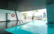 Swimming Pool 7 Comfort Living and Spacious 2BR at Menteng Park Apartment By Travelio