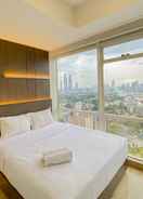 BEDROOM Homey and Tranquil Designed 2BR at Menteng Park Apartment By Travelio