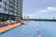 Kolam Renang Comfort and Compact 2BR without Living Room at Osaka Riverview PIK 2 Apartment By Travelio