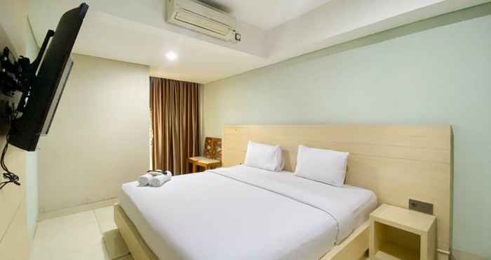 Bedroom Cozy and Tidy Studio Apartment at 21st Floor Warhol (W/R) Residences By Travelio