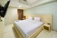 Bedroom Cozy and Tidy Studio Apartment at 21st Floor Warhol (W/R) Residences By Travelio