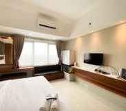 Bedroom 3 Comfort and Enjoy 1BR at Gateway Park LRT City Bekasi Apartment By Travelio