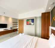 Bedroom 2 Comfort and Enjoy 1BR at Gateway Park LRT City Bekasi Apartment By Travelio