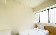 Kamar Tidur 2 Restful and Best Deal 3BR Meikarta Apartment By Travelio