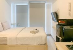 Bedroom 2 Fully Furnished with Comfort Design Studio Apartment Tokyo Riverside PIK 2 By Travelio