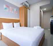 Bedroom 2 Comfy and Best Choice Studio at Grand Dharmahusada Lagoon Apartment By Travelio