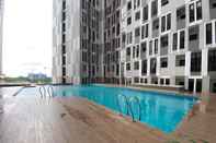 Swimming Pool Simply Look and Comfort 1BR The Alton Apartment By Travelio