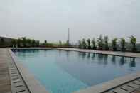 Swimming Pool Simply Look Studio at Tree Park City BSD Apartment By Travelio