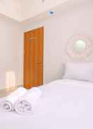 BEDROOM Cozy Stay and Simple 1BR at Evenciio Margonda Apartment By Travelio