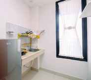 Ruang untuk Umum 4 Cozy Stay and Simple 1BR at Evenciio Margonda Apartment By Travelio