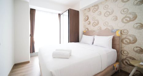 Bedroom 2 Nice and Enjoy 3BR Connected to Mall at Grand Sungkono Lagoon Apartment By Travelio
