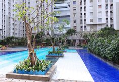 Swimming Pool 5 Tidy and Cozy Stay 1BR Green Bay Pluit Apartment By Travelio