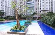 Swimming Pool 5 Tidy and Cozy Stay 1BR Green Bay Pluit Apartment By Travelio