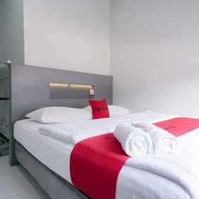 Bedroom 1 RedDoorz Plus Syariah @ Jalan Endro Suratmin Lampung, CV Karya Hidup Sentosa - QUICK Traktor (Cabang Lampung) ホテル