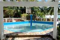 Swimming Pool RedDoorz @ Isla Virginia Beach Resort Aurora Baler