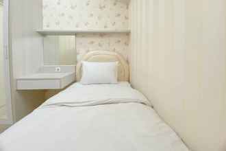 Bedroom 4 Homey and Spacious 3BR at Springlake Summarecon Bekasi Apartment By Travelio