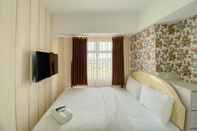 Bedroom Homey and Spacious 3BR at Springlake Summarecon Bekasi Apartment By Travelio