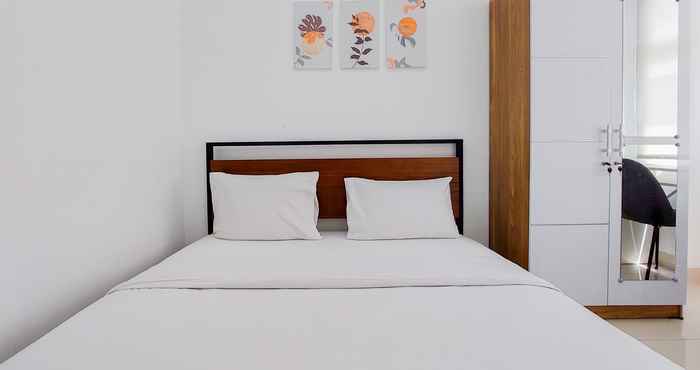 Kamar Tidur Warm and Homey Studio Room Serpong Garden Apartment By Travelio