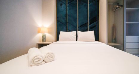 Bedroom 2 Cozy Living 2BR Apartment at Anderson Supermall Mansion By Travelio