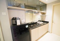 Common Space 4 Cozy Living 2BR Apartment at Anderson Supermall Mansion By Travelio